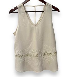 Monteau cream color sleeveless top with detail on bottom size medium